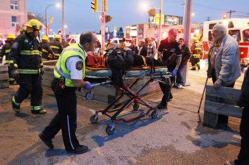 May 1, 2012 - 120501  - A male is taken away by emergency personnel after being extricated from a vehicle which was involved in a motor vehicle collision at the intersection of Notre dame and Arlington Tuesday May 1, 2012. John Woods / Winnipeg Free Press