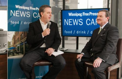 Finance Minister Jim Flaherty talks to columnist Dan Lett at the Winnipeg Free Press News Cafe. Flaherty was in Winnipeg for the ceremony to strike the final penny for circulation.  120504 - Friday, May 04, 2012 -  Melissa Tait / Winnipeg Free Press