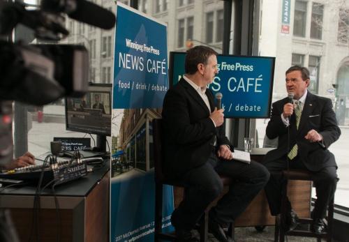 Finance Minister Jim Flaherty talks to columnist Dan Lett on stage at the Winnipeg Free Press News Cafe. Flaherty was in Winnipeg for the ceremony to strike the final penny for circulation.  120504 - Friday, May 04, 2012 -  Melissa Tait / Winnipeg Free Press