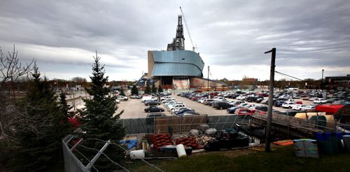The Canadian Museum for Human RIghts' front yard......see story.  May 4, 2012 - (Phil Hossack / Winnipeg Free Press) COLUMNISTS OF SIGHT LINES AND VISION... The front yard of the Canadian Museum for Human Rights is made up of two parking lots, one the contention Parcel 4 Four owned by the city, the other of similar size owned by The Forks. Together today they offer unspoiled sight lines and a wide-open opportunity to make the outside of the museum reflect the message on the inside, and create a landscape thats in harmony with its striking architectural presence. The Forks is taking its time and plans to consult with the community over the next few years. Meanwhile, the city, in its seeming haste to develop its parcel, and approve a contentious¤ a water park,¤ hasnt even consulted the museum on the water park. So what does the museum think of a water park on Parcel 4? I asked Stuart Murray. Someone had to. (18 inches) CMHR
