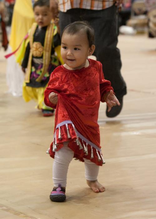Lillee Hotomani, 1-years-old, joins in the inter-tribal dances at the 2012 Traditional Graduation PowWow at University of Manitoba on Saturday.  120505 - Saturday, May 05, 2012 -  Melissa Tait / Winnipeg Free Press