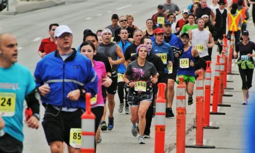 Around 1,900 people took part in the Winnipeg Police Service half-marathon this morning. The eighth annual event started and finished at Assiniboine Park and is expected to raise about $100,000 for Cops for Cancer. Organizers had initially expected about 2,500 participants, but said the weather may have dissuaded some people from coming out. See Jen Skerritt story 120506 May 06, 2012 Mike Deal / Winnipeg Free Press