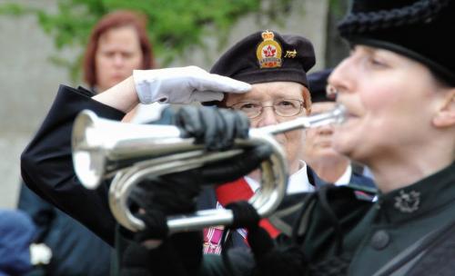 Veteran Jackie Hampshire, Sgt-at-arms Ladies Council Manitoba and Northwest Ontario Command salutes during The Last Post. Veterans take part in the annual Decoration Day Service Parade at the Memorial Boulevard Cenotaph.  120506 May 06, 2012 Mike Deal / Winnipeg Free Press