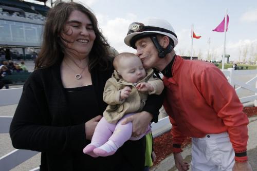 May 6, 2012 - 120506  -  Jockey Paul Nolan kisses Alann Mellon as mother Tracee Mellon looks on after Nolan won the sixth race on The Phenom Sunday May 6, 2012 during the opening day at Assiniboia Downs.    John Woods / Winnipeg Free Press