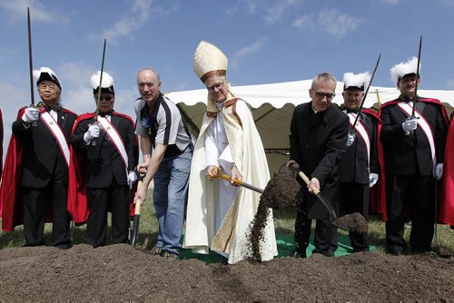 May 6, 2012 - 120506  - Along with members of the Knights of Columbus Mark Desjardins (centre left), grand knight for the St. Gianna's Knights of Columbus, Archbishop James Weisgerber (c) and Father Darrin Gurr (centre right) turn sod at the intersection of McGillivray and Columbia Drive, the building site of St. Gianna Beretta Molla Roman Catholic Church, Sunday May 6, 2012. St. Giannas will be the first new R.C. church built in Winnipeg in more than 50 years. John Woods / Winnipeg Free Press