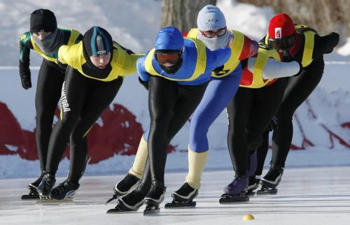 John Woods / Winnipeg Free Press / February 10/07 - 070210  - Emily Levin (second from left), of team Manitoba, goes for the outside position in the 1500m junior heat in the North American Championship at the Susan Auch Oval in Winnipeg Saturday Feb 10/07.