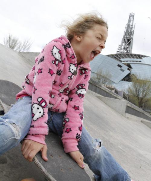 Elleana Wiebe of Niverville yells as she rides down a ramp at the skate park at The Forks on Tuesday. May 08, 2012. SARAH O. SWENSON / WINNIPEG FREE PRESS