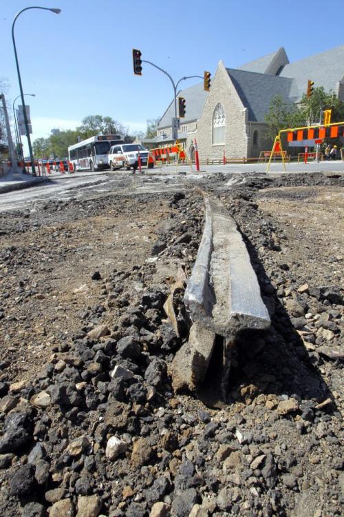 photos at Broadway and Osborne where some old tracks are being dug up.  May 9, 2012  BORIS MINKEVICH / WINNIPEG FREE PRESS