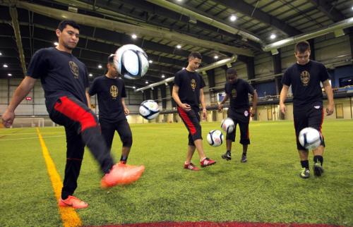 WSA Winnipeg players juggle balls during press event at the indoor soccer complex near University of Manitoba. To go with Tim Campbell story.  May 10, 2012  BORIS MINKEVICH / WINNIPEG FREE PRESS