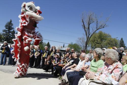 Members of the Flying Lion Dance Troupe perform during the opening ceremonies of the new Winnipeg Branch centre for Fung Loy Kok Taoist Tai Chi on Saturday. The grand opening of this new centre was in conjunction with the 30th anniversary of the Winnipeg Branch. May 12, 2012. SARAH O. SWENSON / WINNIPEG FREE PRESS