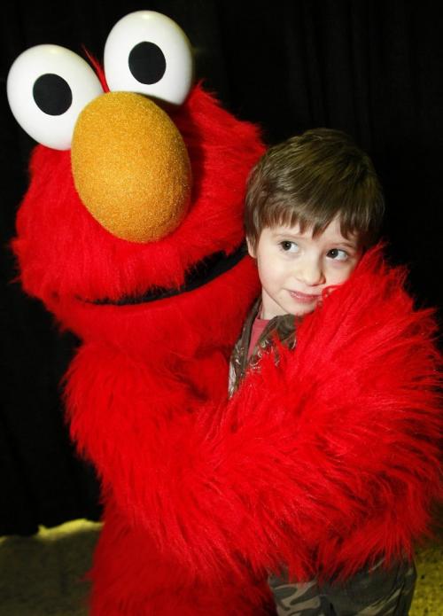 John Woods / Winnipeg Free Press / February 11/07- 070211  - Shelby had her wish granted by the Children's Wish Foundation when she was able to meet Elmo at The Winnipeg Baby and Kids Show at the Convention Centre Sunday Feb 11/07.   Shelby is recovering from cancer