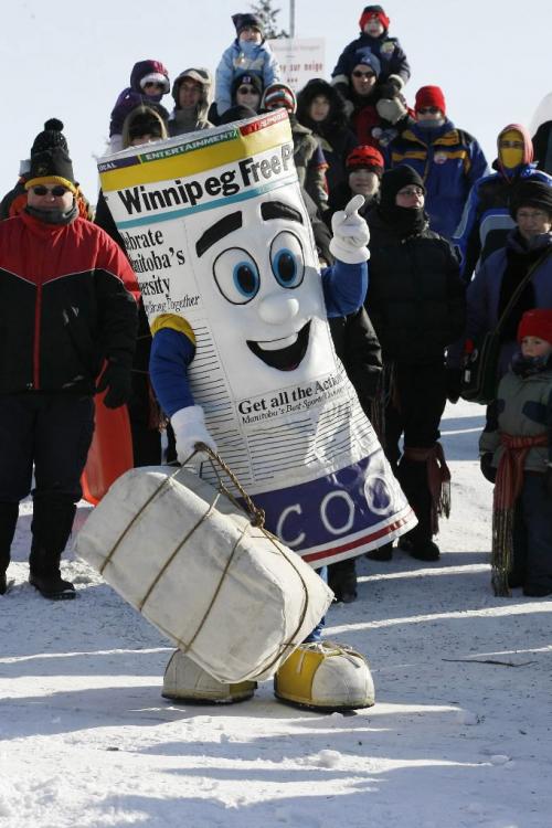 John Woods / Winnipeg Free Press / February 11/07- 070211  - Scoop the mascot gets ready to throw a bale during a bale throwing contest at the Festival du Voyageur Sunday Feb 11/07.    Re: Giroday story