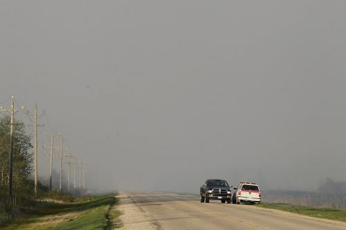 May 13, 2012 - 120513  -  Firefighters from three rural municipalities have been working for two days on a stubborn grass fire just south of highway 201 at road 45E. Half way between Vita and Caliento, Manitoba...just east of 302 on south side of 201.  Tuesday May 13, 2012. They say it looks like it's going to be another bad year for grass fires. John Woods / Winnipeg Free Press