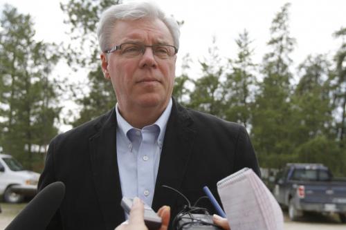 Premier Greg Selinger addresses the media at the Marchand Fire & Maintenance Base before taking a helicopter tour of the nearby areas affected by forest fires. May 14, 2012. SARAH O. SWENSON / WINNIPEG FREE PRESS
