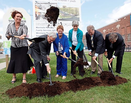 The Dirt was flying at the sod turning for the Specialized Services for Children and Youth  (SSCY) that brings together  many services at a one stop  facility  for children and youth with special needs .Health Minister Theresa Oswald sent the first shovel full of dirt flying as , Premier Greg Selinger , Jeanette Edwards WHRA director for Primary Healthcare , Cheryl Susinski executive director of the Rehabilitation Centre for Children , DR. Brock Wright SR. Vp. Of the Wpg Health Region  , and Bob Adkins campaign co-chair   of SSCY ‚Äì at the building site of the former Christie's Bldg 1147 Notre  Dame Ave KEN GIGLIOTTI  / WINNIPEG FREE PRESS  / May 15 2012