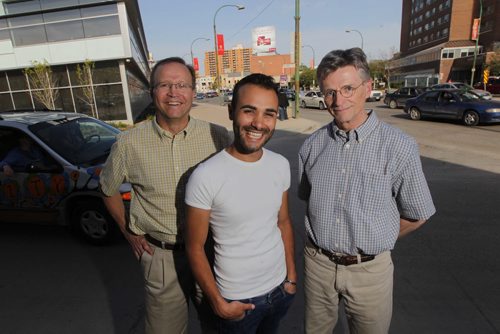 WINNIPEG, MB - A gay man named Hamed from Iran, centre, left- Horst Backe and Mark Rabnett pose for a photo. CAROL SANDERS STORY.  May 17, 2012  BORIS MINKEVICH / WINNIPEG FREE PRESSe