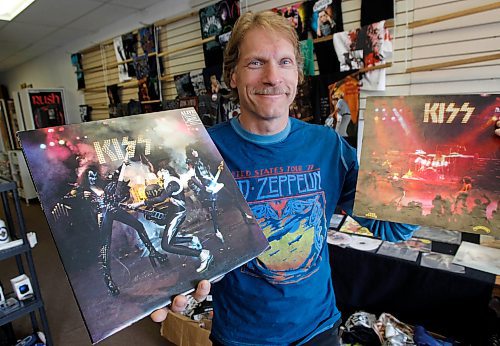 Detour feature on double albums&#x2026;.Ray Giguere at Argy's Collectibles with a copy of of Alive! by Kiss and at right the booklet that also came with the album. David Sanderson story (WAYNE GLOWACKI/WINNIPEG FREE PRESS) Winnipeg Free Press  May 18 2012