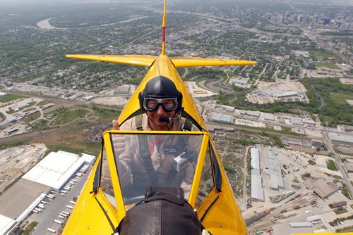 WINNIPEG, MB -Vintage Wings pilot Bruce Evans flies the Boeing Stearman over Winnipeg Friday afternoon. May 18, 2012  BORIS MINKEVICH / WINNIPEG FREE PRESS