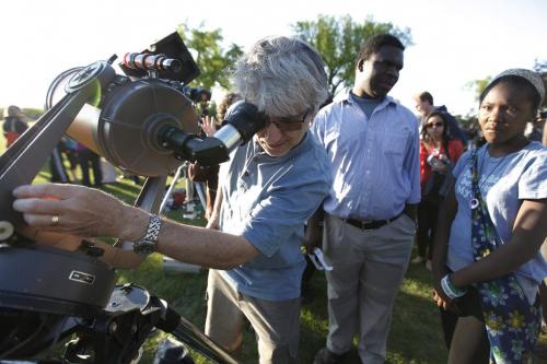 May 20, 2012 - 120520  -  Ron Berard of the Royal Astrological Society of Canada adjusts his telescope for curious star gazers at Assiniboine Park. Winnipeggers hit Assiniboine Park to catch a glimpse of a partial eclipse Sunday May 20, 2012.    John Woods / Winnipeg Free Press