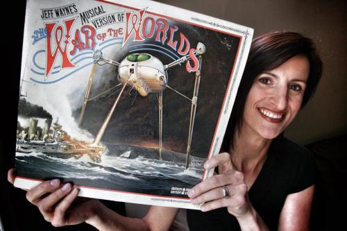 Lisa Saunders, publicist and musician, holds the double album, Jeff Wayne's Musical Version of War of the Worlds.  See David Sanderson story 120522 May 22, 2012 Mike Deal / Winnipeg Free Press