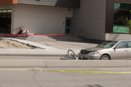A female cyclist was struck and killed on Higgins Ave just west of Main Street on Wednesday morning.  120523 - Wednesday, May 23, 2012 -  Melissa Tait / Winnipeg Free Press