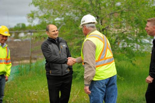 WINNIPEG, MB - Gordon Bell High School Vice Principal Aaron Benarroch shakes hands with Shelmerdine Ltd. owner Bo Wohlersafter afterdeciding where to hold the ground breaking ceremony tomorrow for the future green space beside the school on Monday, May, 28th, 2012. After fighting for years for the property, the school has raised $400,000 of the 1.5 million required to install field turf and complete the project. Photo by Cole Breiland/ WInnipeg Free Press