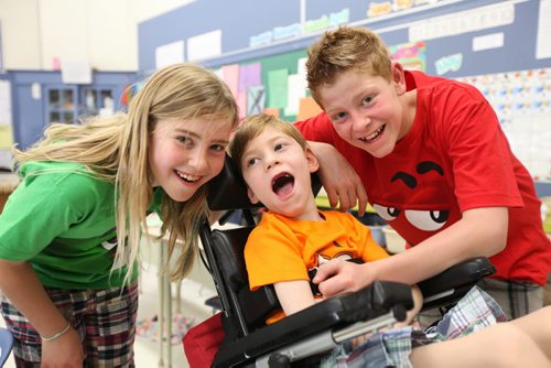 Seven year old Tyler laughs with his sister Emily and big brother Griffin  (who is part of the ongoing series on the class of 2017( at Windsor School. See Doug Speirs story Windsor School 2017 project. May 28  2012 (Ruth Bonneville/Winnipeg Free Press)