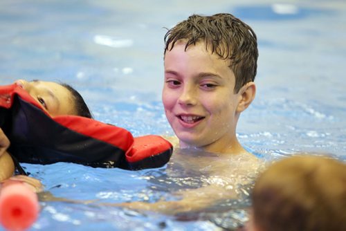 Quinn volunteerss at St. Amant Centre in the pool helping clients enjoy a swim in the water. See Doug Speirs story Windsor School 2017 project. May 28  2012 (Ruth Bonneville/Winnipeg Free Press)