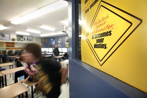 Grade seven Windsor School studetns rush out of class at lunch hour as a yellow yield sign is posted on thier classroom door with the following statement. Watch your thoughts, they become words. Watch your words, they become actions. Watch your actions, they become habits. Watch your habits, they become your character. Watch your character, it becomes your destiny. See Doug Speirs story Windsor School 2017 project. May 28  2012 (Ruth Bonneville/Winnipeg Free Press)