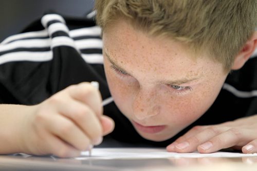 Jesse works on a writing project in class. See Doug Speirs story Windsor School 2017 project. May 28  2012 (Ruth Bonneville/Winnipeg Free Press)