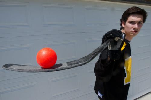 Dylan Pascoe balances a street hockey ball near his south Winnipeg home on May 31, 2012. Pascoe is looking forward to his six week trip to the Czech Republic to represent Canada at the under twenty World Ball Hockey tournament. (Photo by Cole Breiland/ Winnipeg Free Press) Winnipeg Free Press