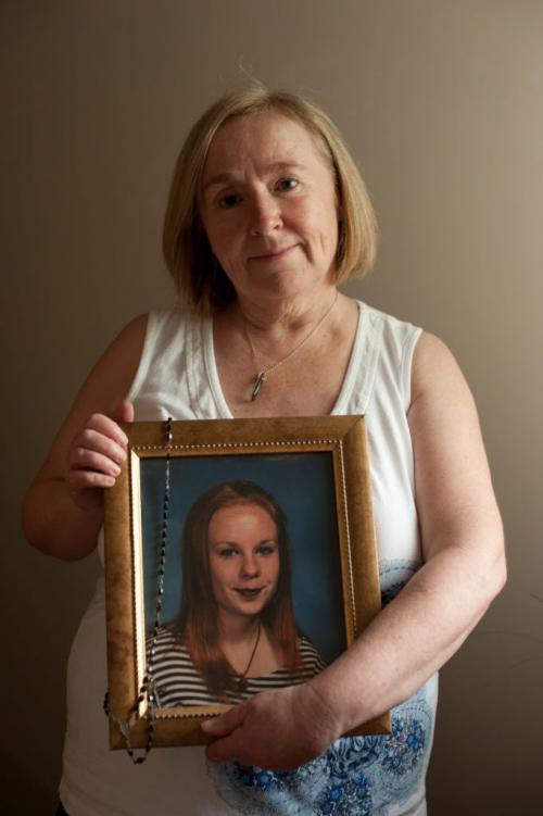 Elaine Stevenson holds a portrait of her daughter Alyssa with her rosary draped over it as it hangs in the family home on June 1st, 2012. Stevenson got the rosary from her grandmother, whom Alyssa was very close with. (Photo by Cole Breiland/ Winnipeg Free Press) Winnipeg Free Press