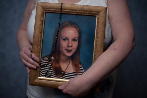 Elaine Stevenson holds a portrait of her daughter Alyssa with her rosary draped over it as it hangs in the family home on June 1st, 2012. Stevenson got the rosary from her grandmother, whom Alyssa was very close with. (Photo by Cole Breiland/ Winnipeg Free Press) Winnipeg Free Press