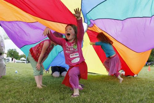 June 3, 2012 - 120603  -  Under a parachute Zaiah McDowell plays with her sister Arlie (R) and Ayvlyn Campbell (L) at Party For The Park at Assiniboine Park Sunday June 3, 2012.    John Woods / Winnipeg Free Press