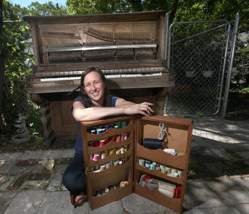 Sarah Michaelson (DJ Mama Cutsworth) poses with some of her favorite stuff, a family piano decaying in her back yard, a wooden sewing box. Carolin Vesely tale. my stuff .... June 5-2012 - (Phil Hossack / Winnipeg Free Press)
