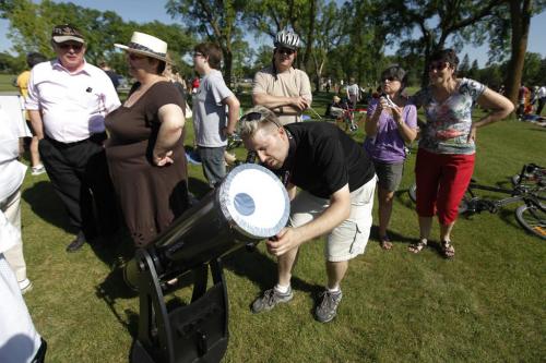June 5, 2012 - 120605  -  Brian Stach of the Royal Astronomical Society of Canada sets up his telescope for some waiting star gazers who want to see Venus cross against the sun at Assiniboine Park Tuesday June 5, 2012. The next time this will happen is in the next century. John Woods / Winnipeg Free Press