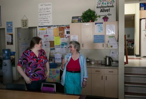 Christie Paul, neighbourhood resource coordinator, laughs with Elaine Bishop in the drop-in area of the North Point Douglas Women's Centre.   (Story by Randy Turner) Melissa Tait / Winnipeg Free Press
