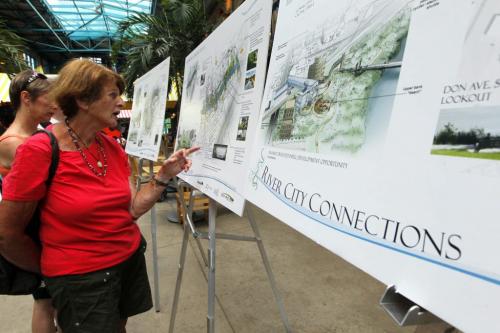 River City Connections at The Forks. They are showing a vision of river developement in Winnipeg. Here is a person from the public that is looking at the drawings. She agreed to be photographed but she prefered to not have her name used. June 7, 2012  BORIS MINKEVICH / WINNIPEG FREE PRESS