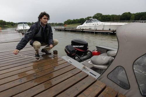 June 10, 2012 - 120610  -Justin Trudeau re-ties a boat prior to a Liberal party meeting held at the Pony Corral Sunday June 10, 2012. Trudeau took a short boat ride to look at Winnipeg's new stadium at the University of Manitoba. John Woods / Winnipeg Free Press