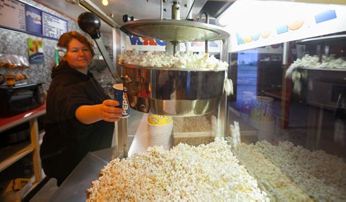 Marlene Nelson gathers some freshly made popcorn before showtime at the Stardust Drive-In in Morden. 120526 - Saturday, May 26, 2012 -  Melissa Tait / Winnipeg Free Press