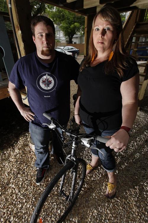 June 11, 2012 - 120611  -  Rejean Robert and Brenda Harder photographed outside their apartment Monday June 11, 2012. The couple had their bikes stolen on the weekend and after police allegedly did little for them they tracked down the thieves and recovered one of the bikes. John Woods / Winnipeg Free Press