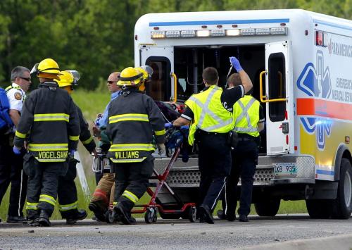 MVC - Mini van vs. Semi on the perimeter highway eastbound just west of St. Mary's (in the south end of the city). Here someone that was injured is loaded up into an ambulance. June 12, 2012  BORIS MINKEVICH / WINNIPEG FREE PRESS