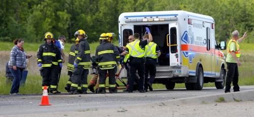 MVC - Mini van vs. Semi on the perimeter highway eastbound just west of St. Mary's (in the south end of the city). Here someone that was injured is loaded up into an ambulance. June 12, 2012  BORIS MINKEVICH / WINNIPEG FREE PRESS