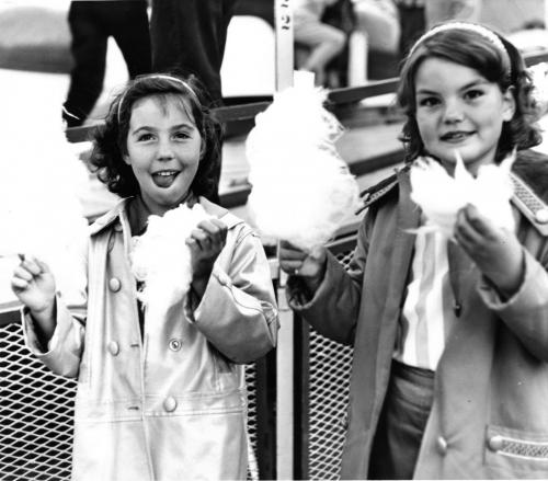 Winnipeg Free Press Archives July 3, 1961 Red River Exhibition Parade. (l-r) Linda Jackin, 9, and Nancy Flavell, 9, enjoy treats at the parade.