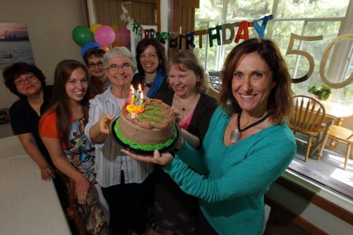 Sara Osegueda,  Holly Setlack, Brenda Dozenko, sister Jo-Ann Duggan, Rose Marie Reimer, Kyla Wiebe, and Margaret Haugen pose for a photo with the birthday cake for Jocelyn Hutton, who would have been 50 years old if she had lived. Jocelyn House Hospice is a home where our family includes terminally ill residents in the final stages of life.  June 14, 2012  BORIS MINKEVICH / WINNIPEG FREE PRESS