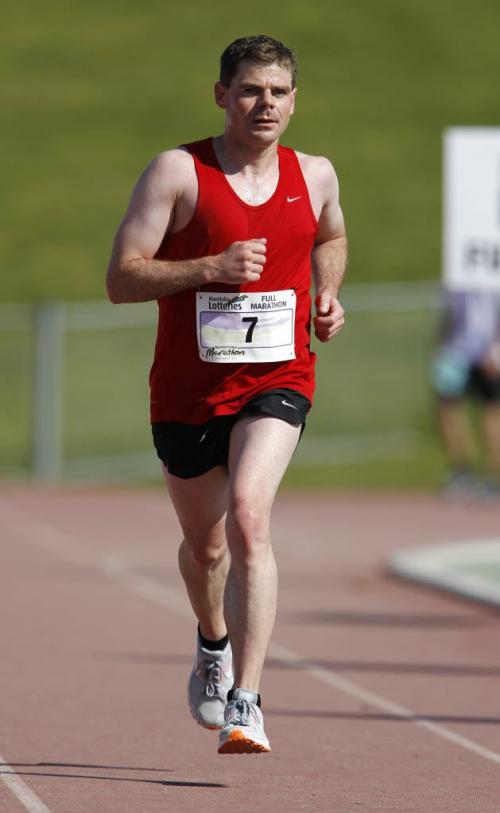 Past full marathon winner, Mike Booth, nears the finish line at the University of Manitoba during the Manitoba Marathon, Sunday, June 17, 2012. (TREVOR HAGAN/WINNIPEG FREE PRESS)