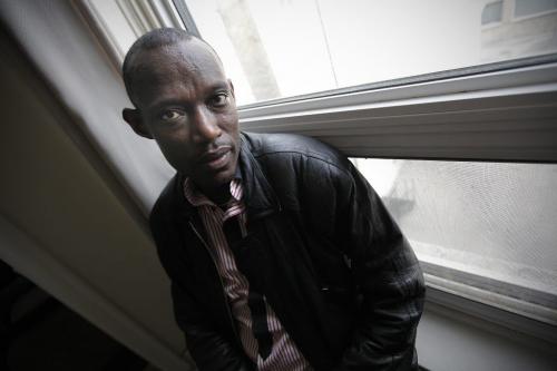 June 18, 2012 - 120618 - Cyrilo Simpunga, a recent refugee from the Congo, is photographed in his downtown apartment in Winnipeg Monday June 12, 2012. Simpunga had his left leg cut off during the Congo civil war in 2004. John Woods / Winnipeg Free Press