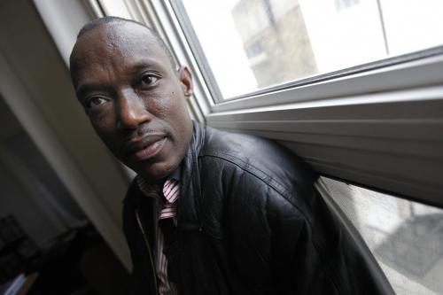 June 18, 2012 - 120618 - Cyrilo Simpunga, a recent refugee from the Congo, is photographed in his downtown apartment in Winnipeg Monday June 12, 2012. Simpunga had his left leg cut off during the Congo civil war in 2004. John Woods / Winnipeg Free Press