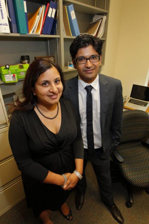 Dr. Shantanu Banerji, an oncologist researcher and practitioner who has authored a paper on a gnome-based breast-cancer treatment discovery that will be published in the prestigious medical journal  Nature on Thursday. Also in photo is his wife Versha Banerji. June 19, 2012  BORIS MINKEVICH / WINNIPEG FREE PRESS