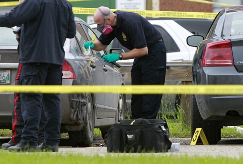 Members of the Winnipeg Police Identification Unit  gather evidence at a scene in the 100 block of Clayton Dr. where a person was seriously assaulted earlier Wednesday morning. Julie Carl story. (WAYNE GLOWACKI/WINNIPEG FREE PRESS) Winnipeg Free Press  June 20 2012. A woman who died after being stabbed in a parking lot in the St. Vital area this morning, June 20 2012 has been identified by friends as Kaila Tran. Police received a call just after 7 a.m. about an injured person in the 100 block of Clayton Drive this morning. This is Winnipeg's 17th homicide of 2012. Drake David Moslenko Treyvonne Willis